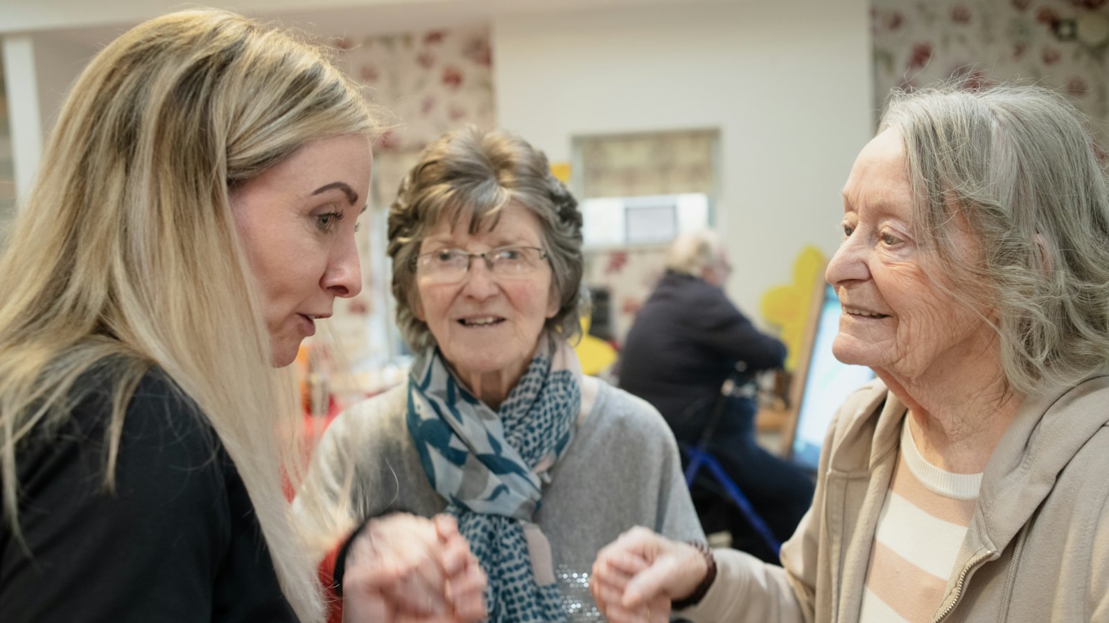 Older women in conversation during a supportive group session